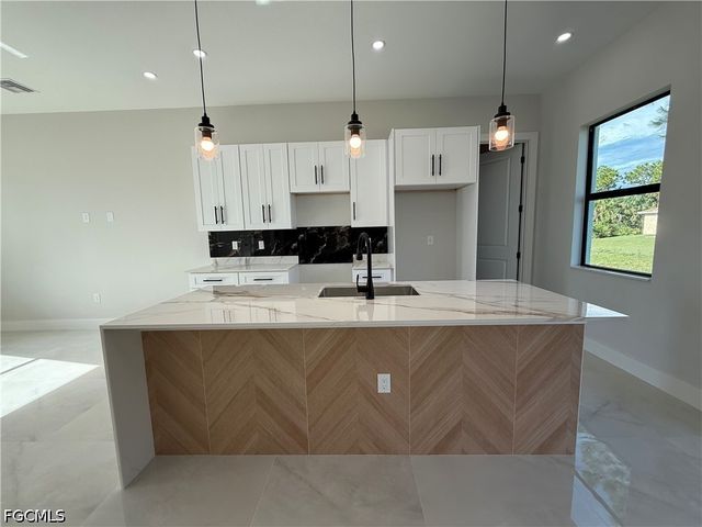 824 Dawhert AVE S, Lehigh Acres, FL 33974