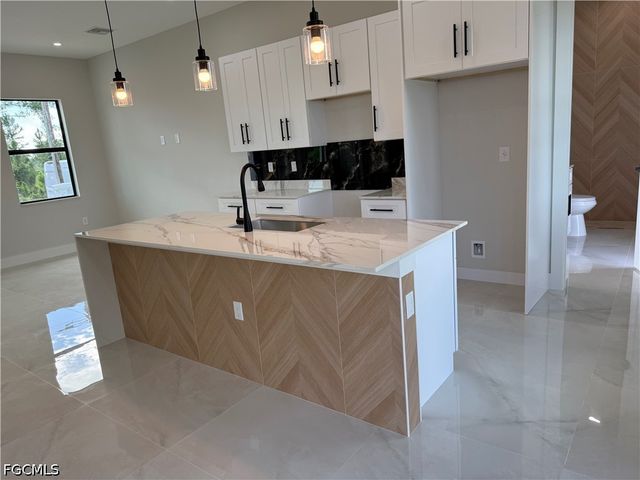 824 Dawhert AVE S, Lehigh Acres, FL 33974
