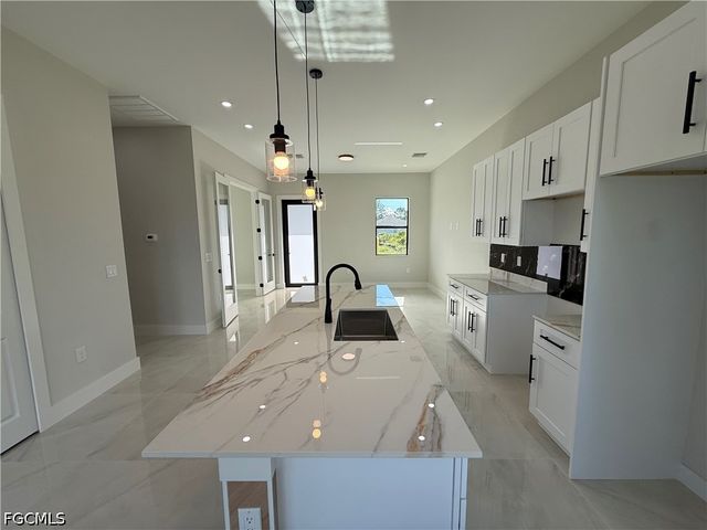 824 Dawhert AVE S, Lehigh Acres, FL 33974