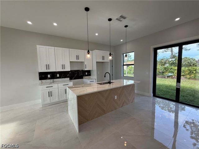 824 Dawhert AVE S, Lehigh Acres, FL 33974