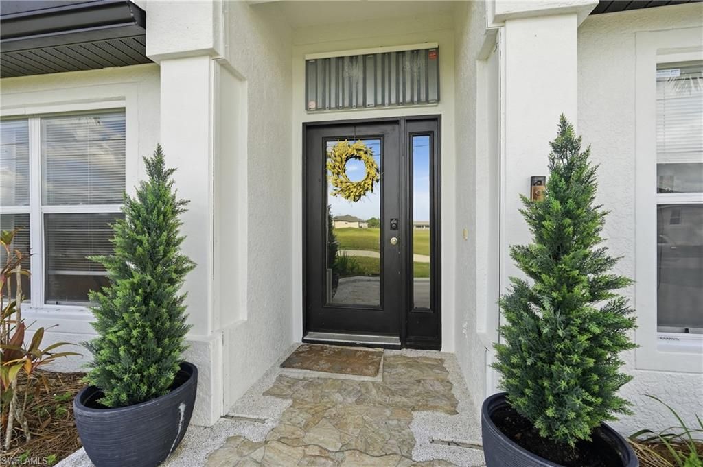 2523 NW Juanita PL, CAPE CORAL, FL 33993 — photo 2