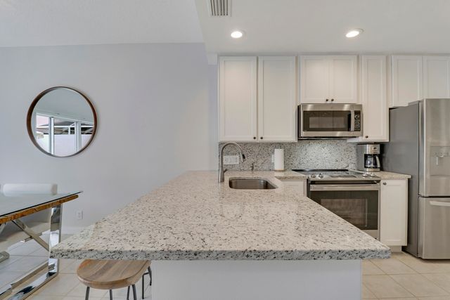73 Laurel Oaks Circle, Jupiter, FL 33469