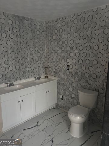 614 Alfred C Carson, Sandersville, GA 31082