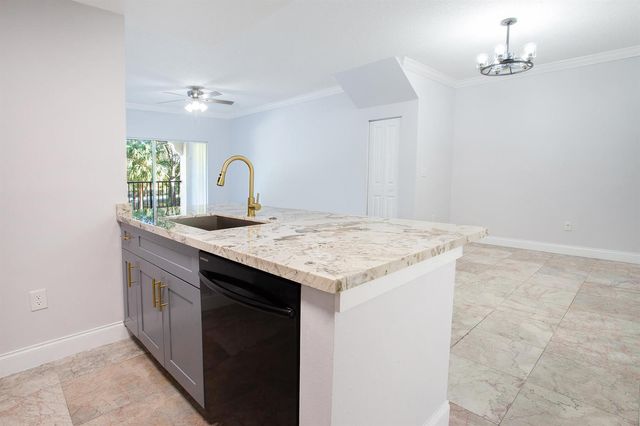5860 W Sample Road 204, Coral Springs, FL 33063