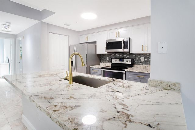 5860 W Sample Road 204, Coral Springs, FL 33063