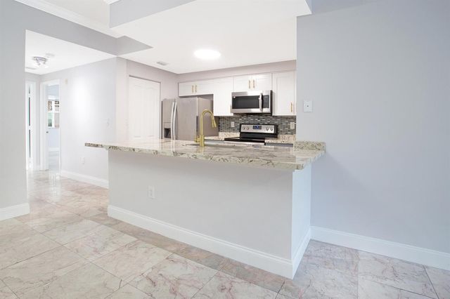 5860 W Sample Road 204, Coral Springs, FL 33063