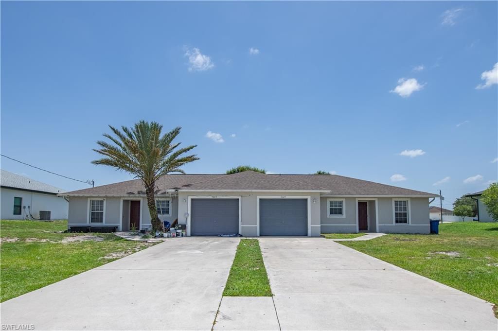 5047/5049 Centennial BLVD, LEHIGH ACRES, FL 33971 — exterior