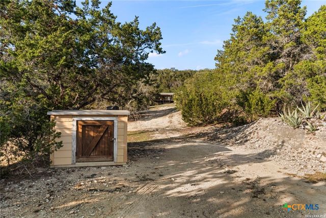 1597 Pipe Springs Drive, Lakehills, TX 78063
