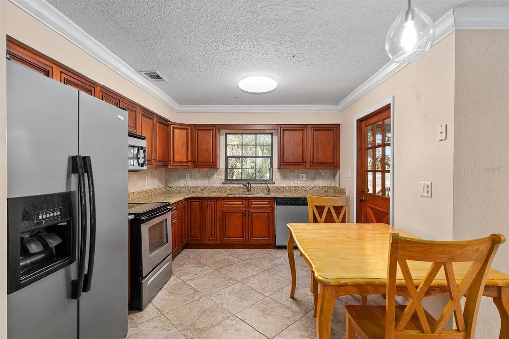 Image 23 of property listing at 11990 SE 112TH AVENUE ROAD, Belleview, FL 34420