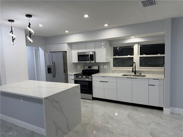 715 Shadyside ST, Lehigh Acres, FL 33936