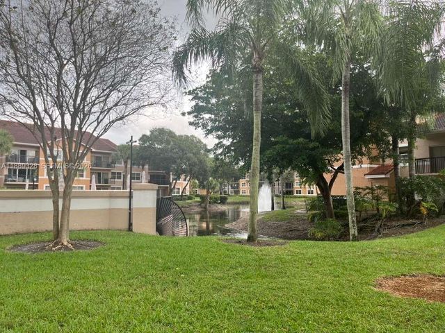 8977 Wiles Rd 103, Coral Springs, FL 33067