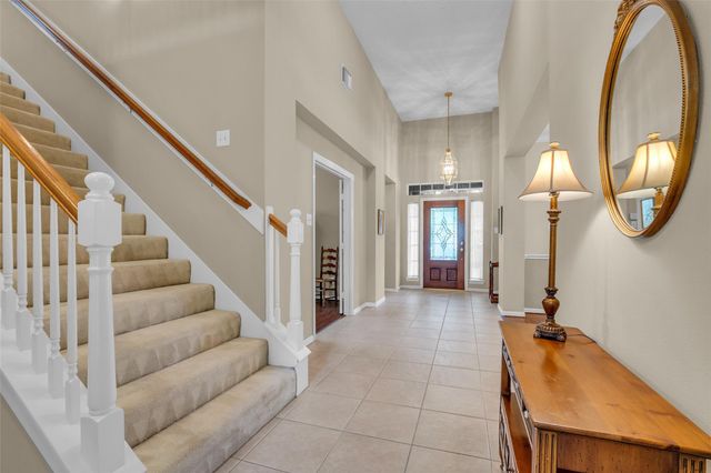 65 W Sienna Place, The Woodlands, TX 77382