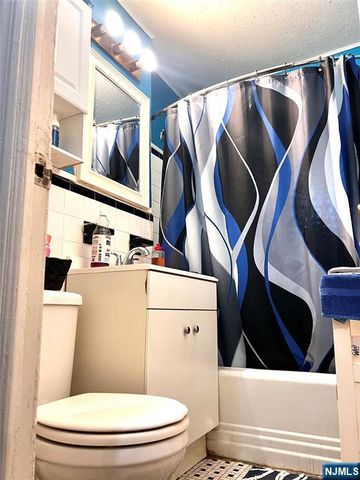 27 Melmore Gardens, East Orange, NJ 07017