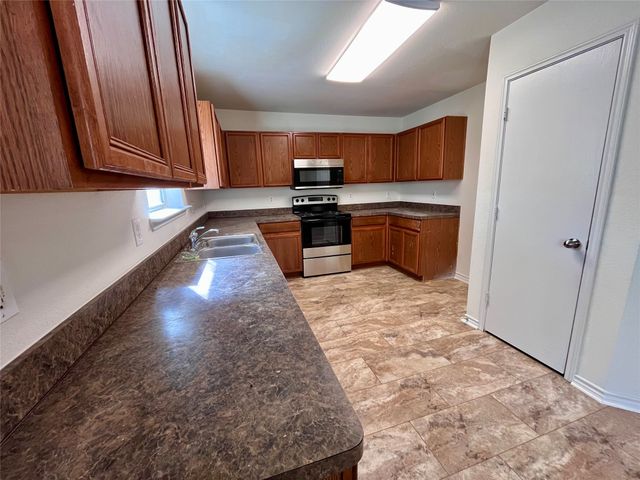 7002 Wax Berry Drive, Dallas, TX 75249