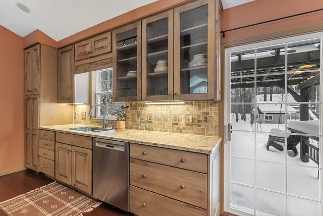 9685 Woodys Run, Long Lake Twp, MI 49684