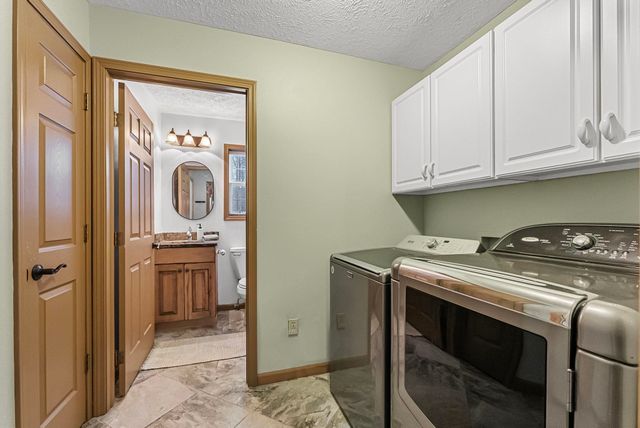 9685 Woodys Run, Long Lake Twp, MI 49684