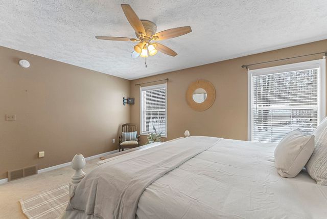 9685 Woodys Run, Long Lake Twp, MI 49684