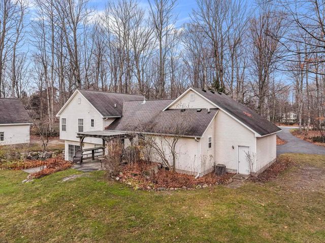 9685 Woodys Run, Long Lake Twp, MI 49684