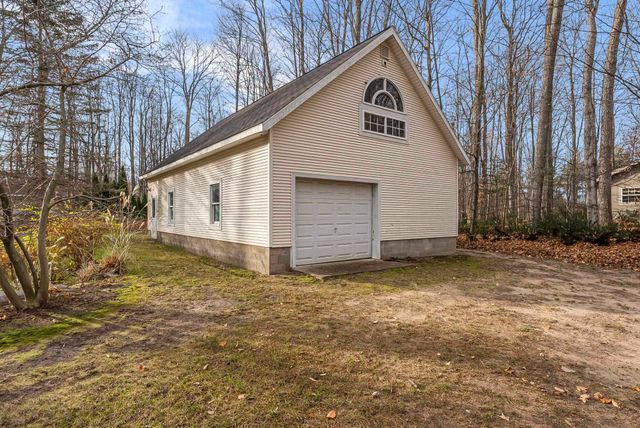 9685 Woodys Run, Long Lake Twp, MI 49684