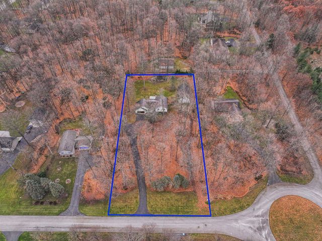 9685 Woodys Run, Long Lake Twp, MI 49684