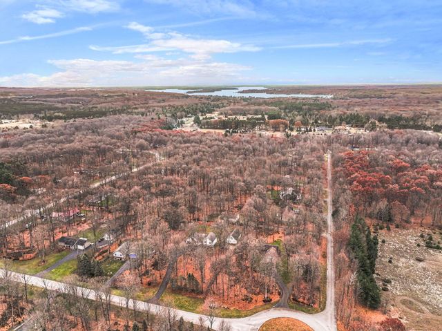 9685 Woodys Run, Long Lake Twp, MI 49684