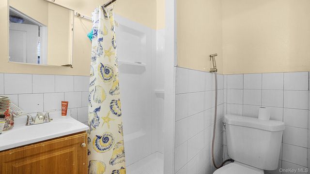 9520 127th Street, Richmond Hill, NY 11419