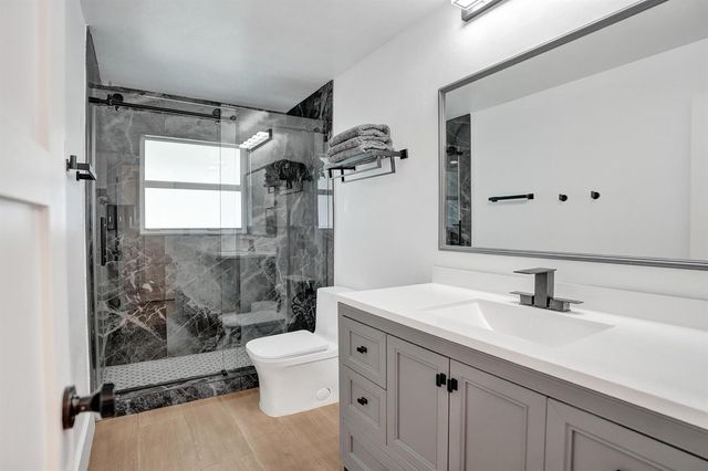 2 Mendota Lane, Sea Ranch Lakes, FL 33308