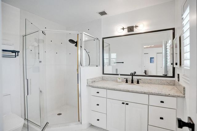 2 Mendota Lane, Sea Ranch Lakes, FL 33308