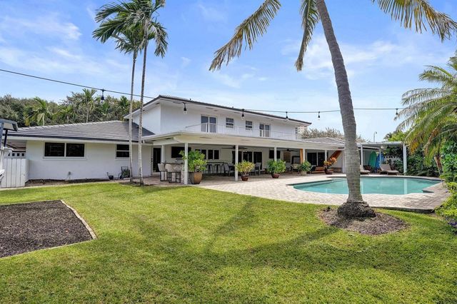 2 Mendota Lane, Sea Ranch Lakes, FL 33308