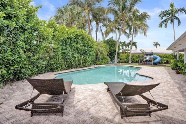 2 Mendota Lane, Sea Ranch Lakes, FL 33308