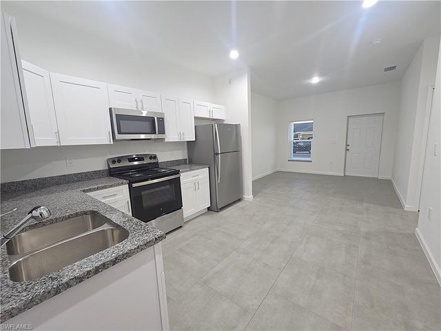 4111 8th ST SW, Lehigh Acres, FL 33976