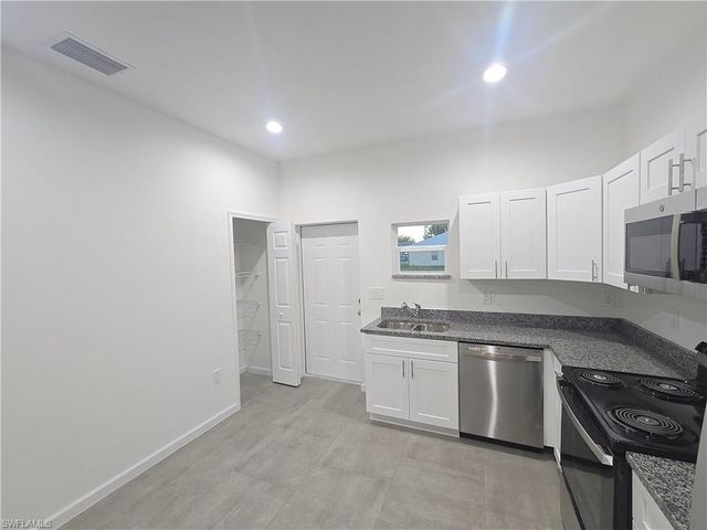 4111 8th ST SW, Lehigh Acres, FL 33976