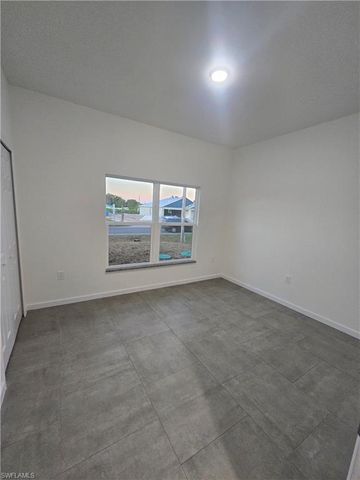 4111 8th ST SW, Lehigh Acres, FL 33976
