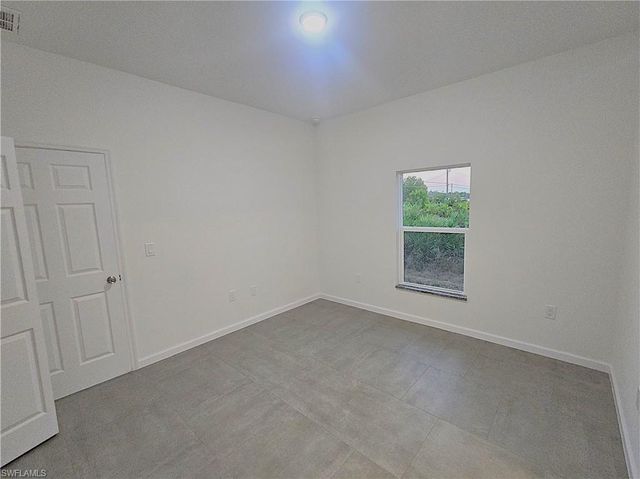 4111 8th ST SW, Lehigh Acres, FL 33976