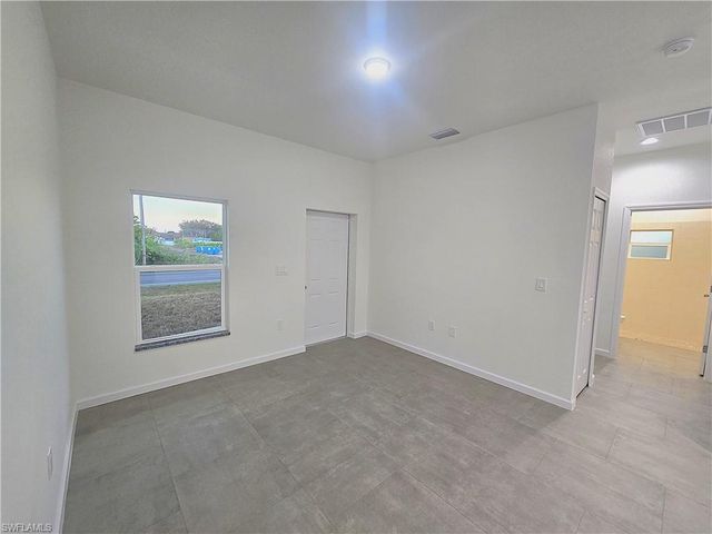 4111 8th ST SW, Lehigh Acres, FL 33976