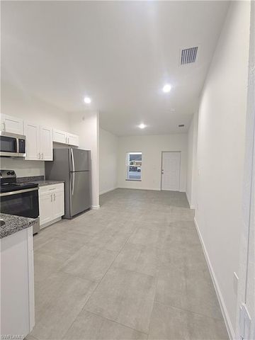 4111 8th ST SW, Lehigh Acres, FL 33976