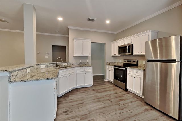 26873 Manor Falls Drive, Kingwood, TX 77339