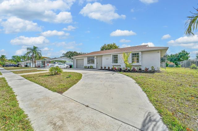 434 NE Electra Avenue, Port St. Lucie, Port St Lucie, FL 34983