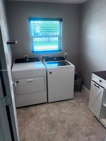 103 Prado Street, Royal Palm Beach, FL 33411