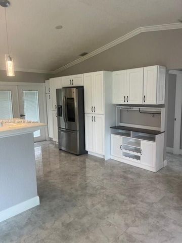 103 Prado Street, Royal Palm Beach, FL 33411