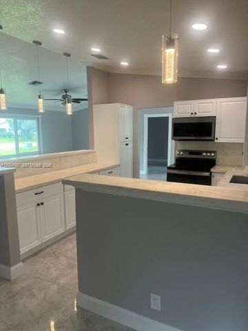 103 Prado Street, Royal Palm Beach, FL 33411