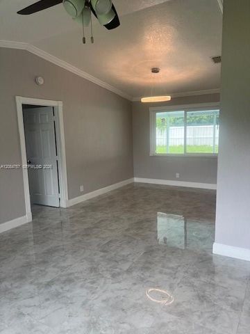 103 Prado Street, Royal Palm Beach, FL 33411