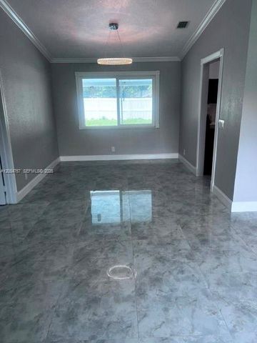 103 Prado Street, Royal Palm Beach, FL 33411