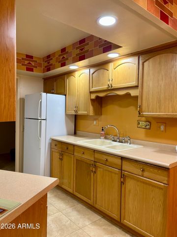 10878 W COGGINS Drive, Sun City, AZ 85351