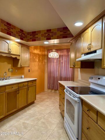 10878 W COGGINS Drive, Sun City, AZ 85351