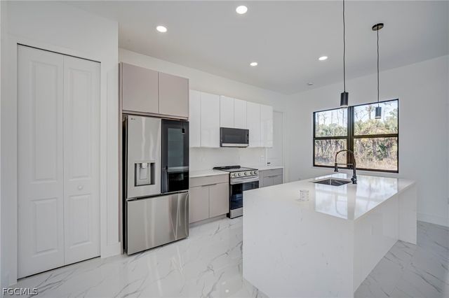 1927 Redmont AVE, Lehigh Acres, FL 33972