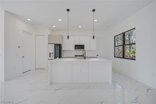 1927 Redmont AVE, Lehigh Acres, FL 33972