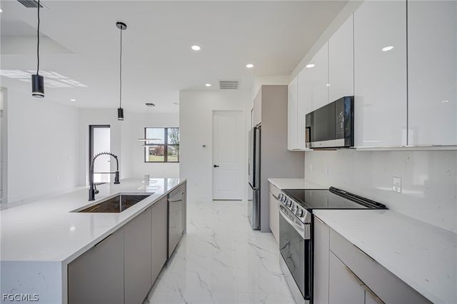 1927 Redmont AVE, Lehigh Acres, FL 33972