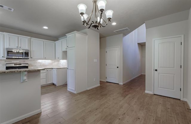 12960 Orion Court E, Willis, TX 77318