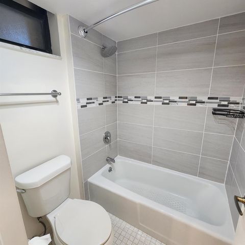 5390 Woodland Lakes Drive 102, Palm Beach Gardens, FL 33418